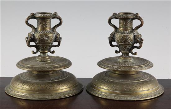 A pair of Italian Renaissance Venetian bronze candlesticks, 16th/17th century, 5.5in.